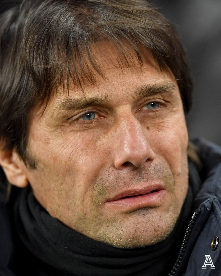 closeup shot of Antonio Conte with an inscrutable expression