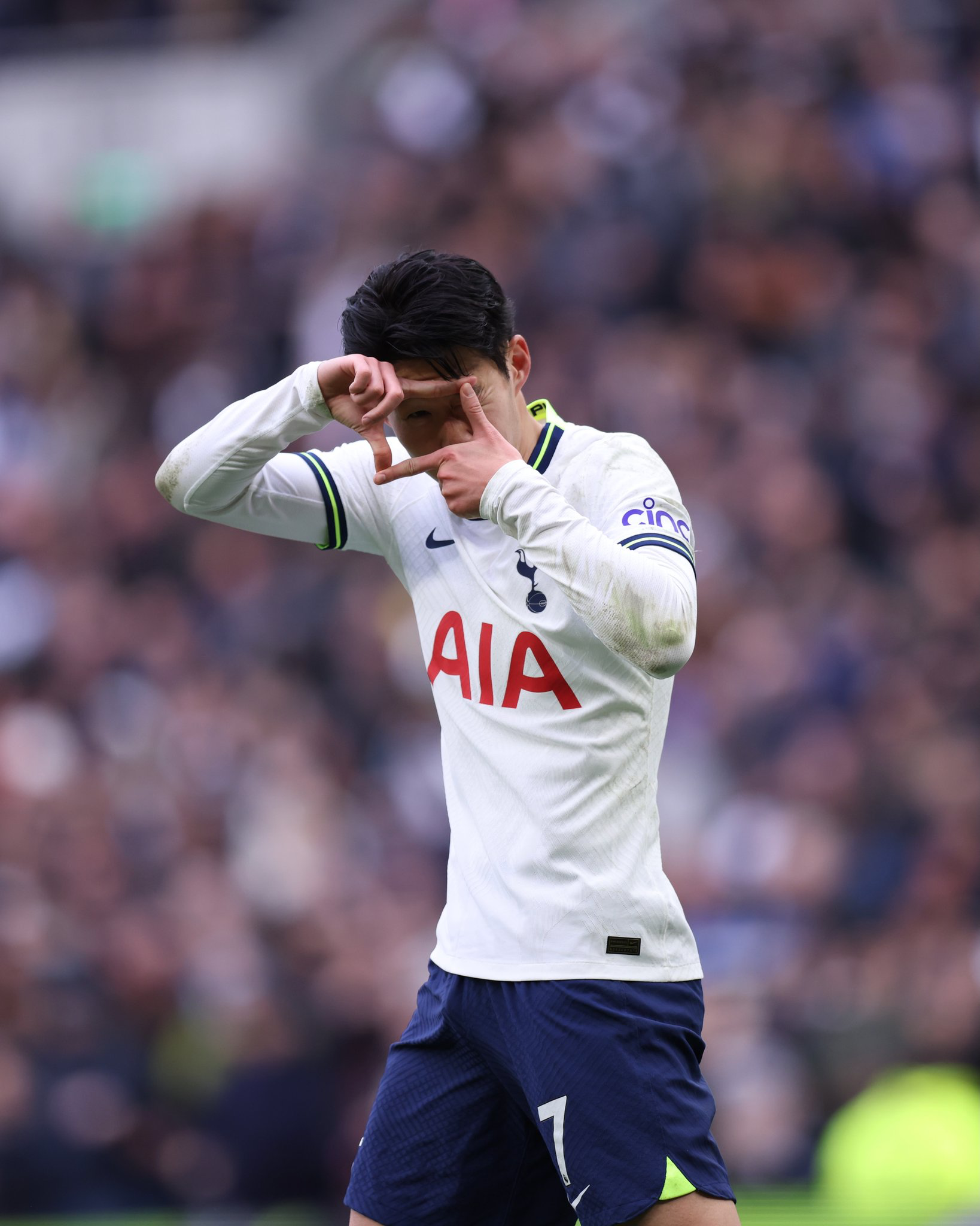 Son Heung-min does his signature photo frame goal celebration.