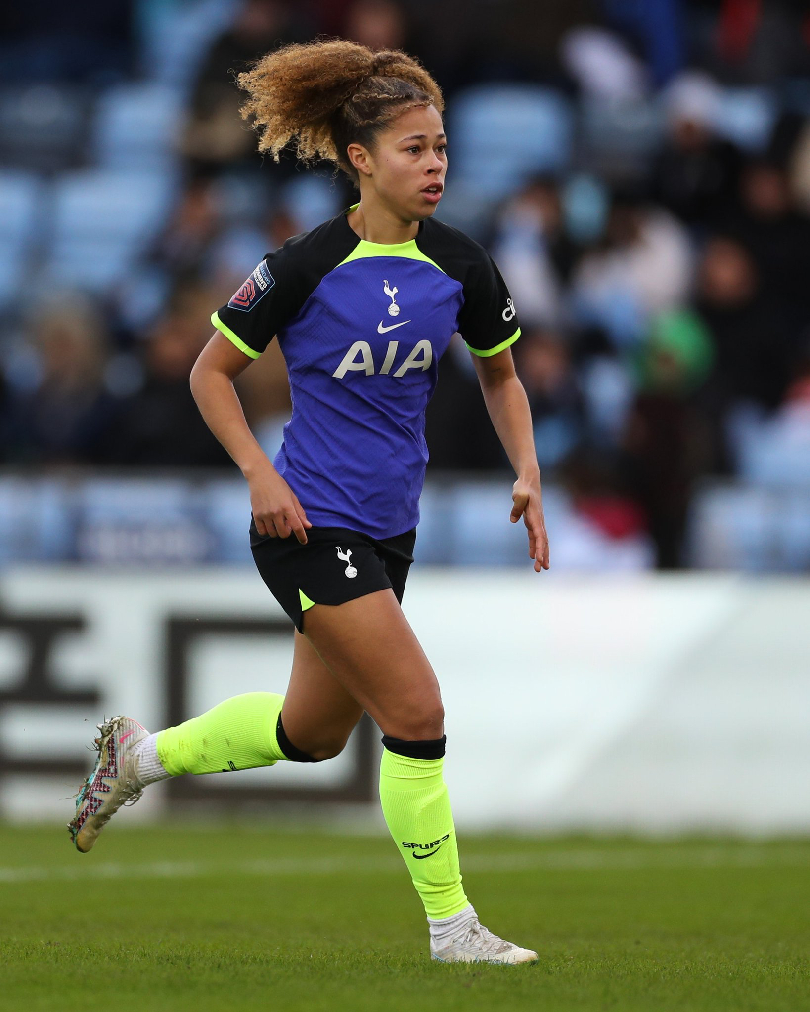 Lenna Gunning-Williams enters the pitch on her WSL debut.