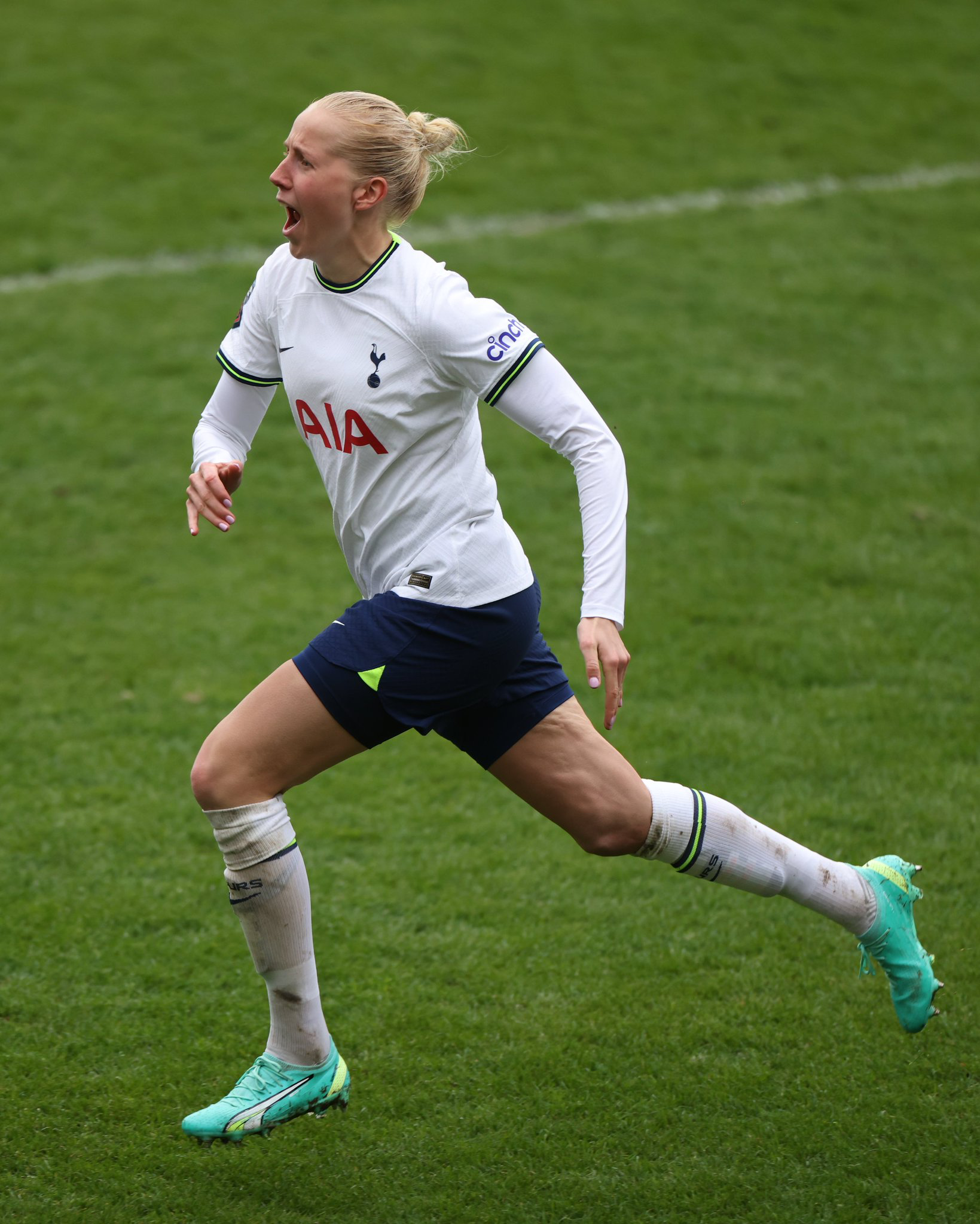 Eveliina Summanen roars in delight after scoring one of her two goals in the game.