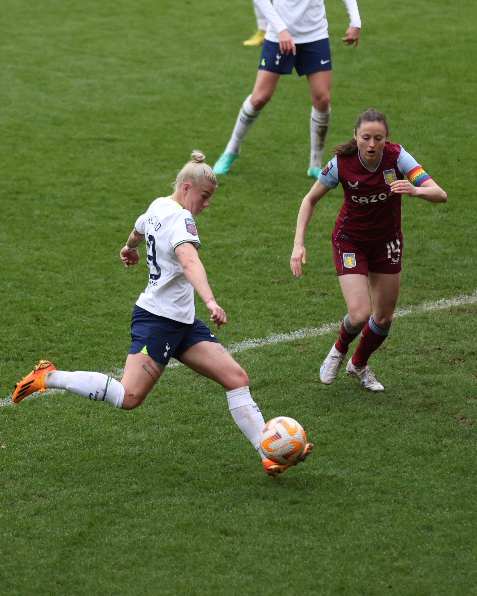 Beth England strikes to score Spurs' third goal.