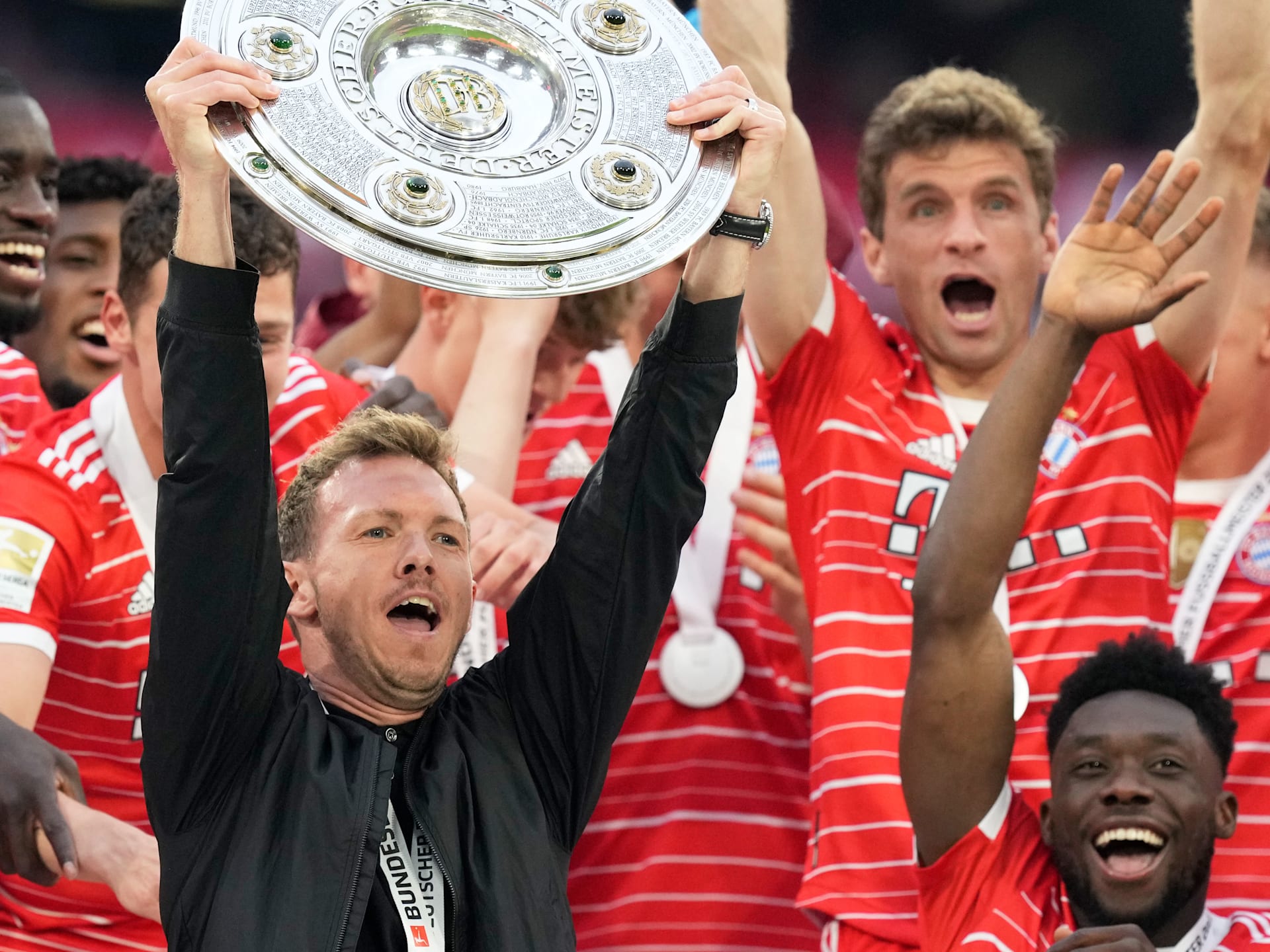 Julian Nagelsmann holds the Meisterschale trophy after Bayerns 2021/22 title win.