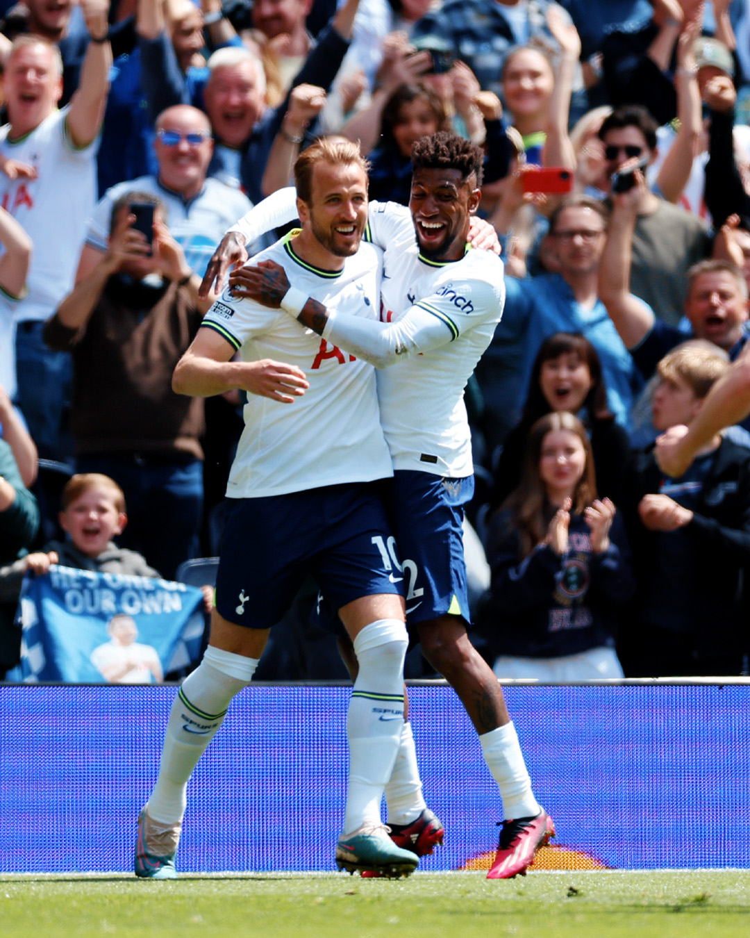 Emerson Royal hugs Harry Kane after the latter's almost-free kick goal.