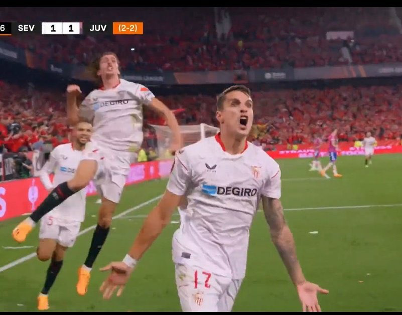 Erik Lamela celebrates his tie-winning goal as Bryan Gil jumps into the air behind him.