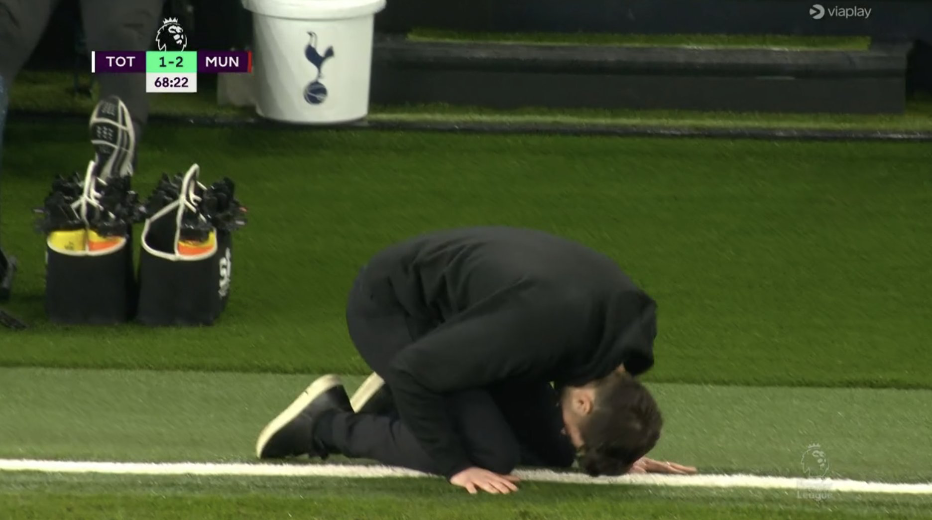 Ryan Mason prostrating in frustration after Eric Dier missed a shot against Manchester United.