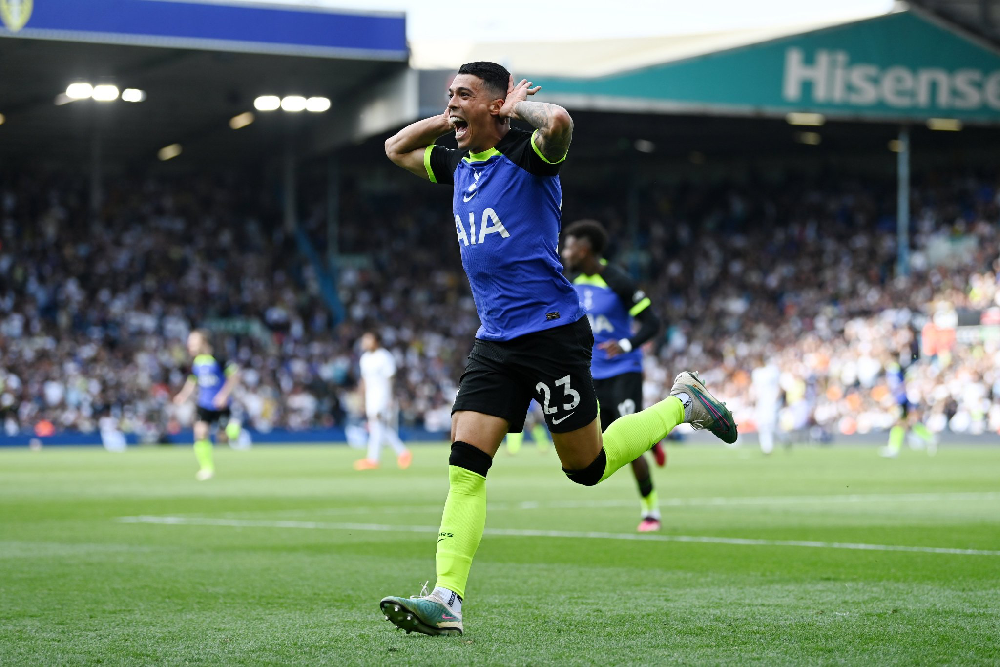 Pedro Porro celebrates scoring by putting his hands to his ears.