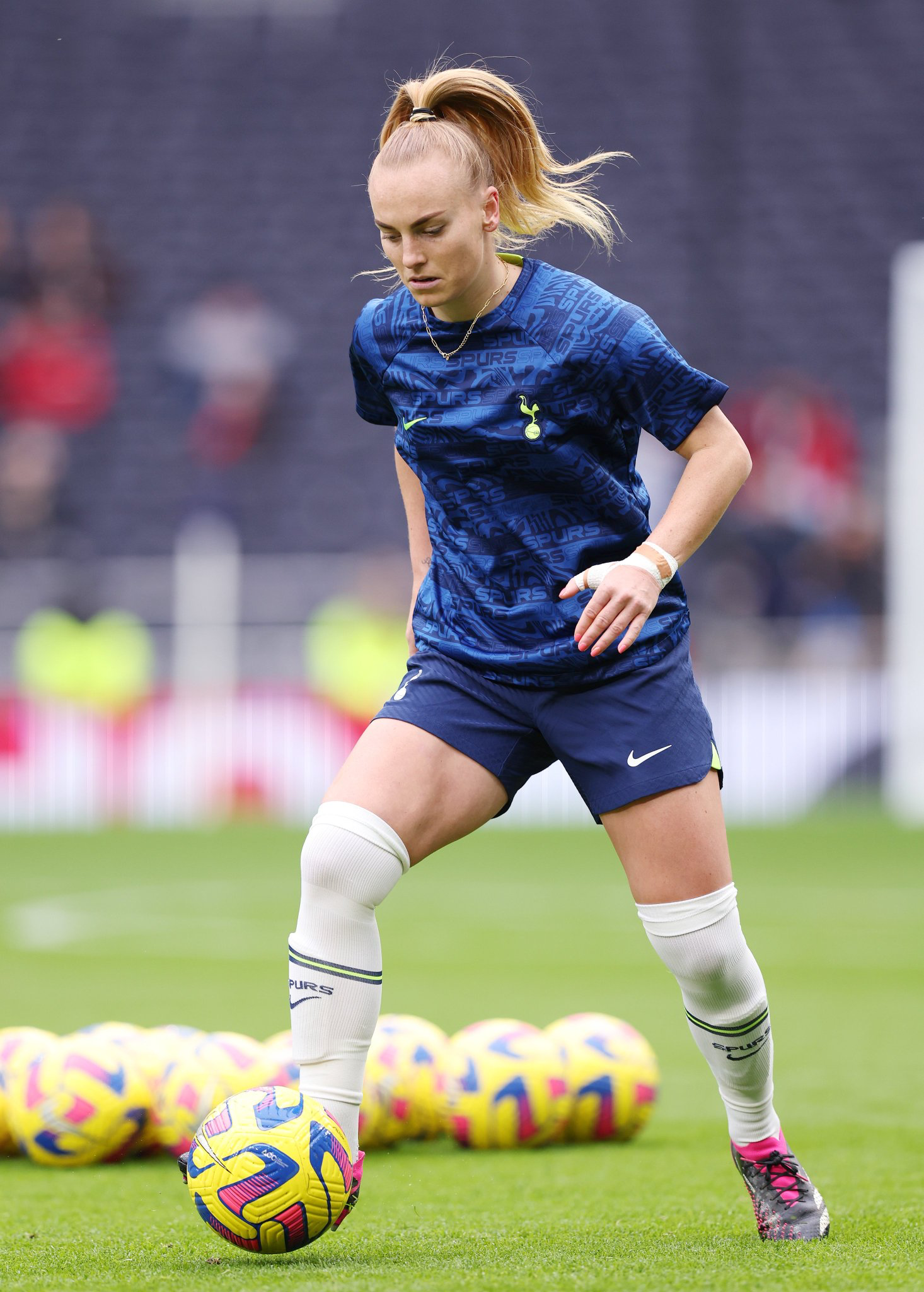 Molly Bartrip controls the ball during a warmup.