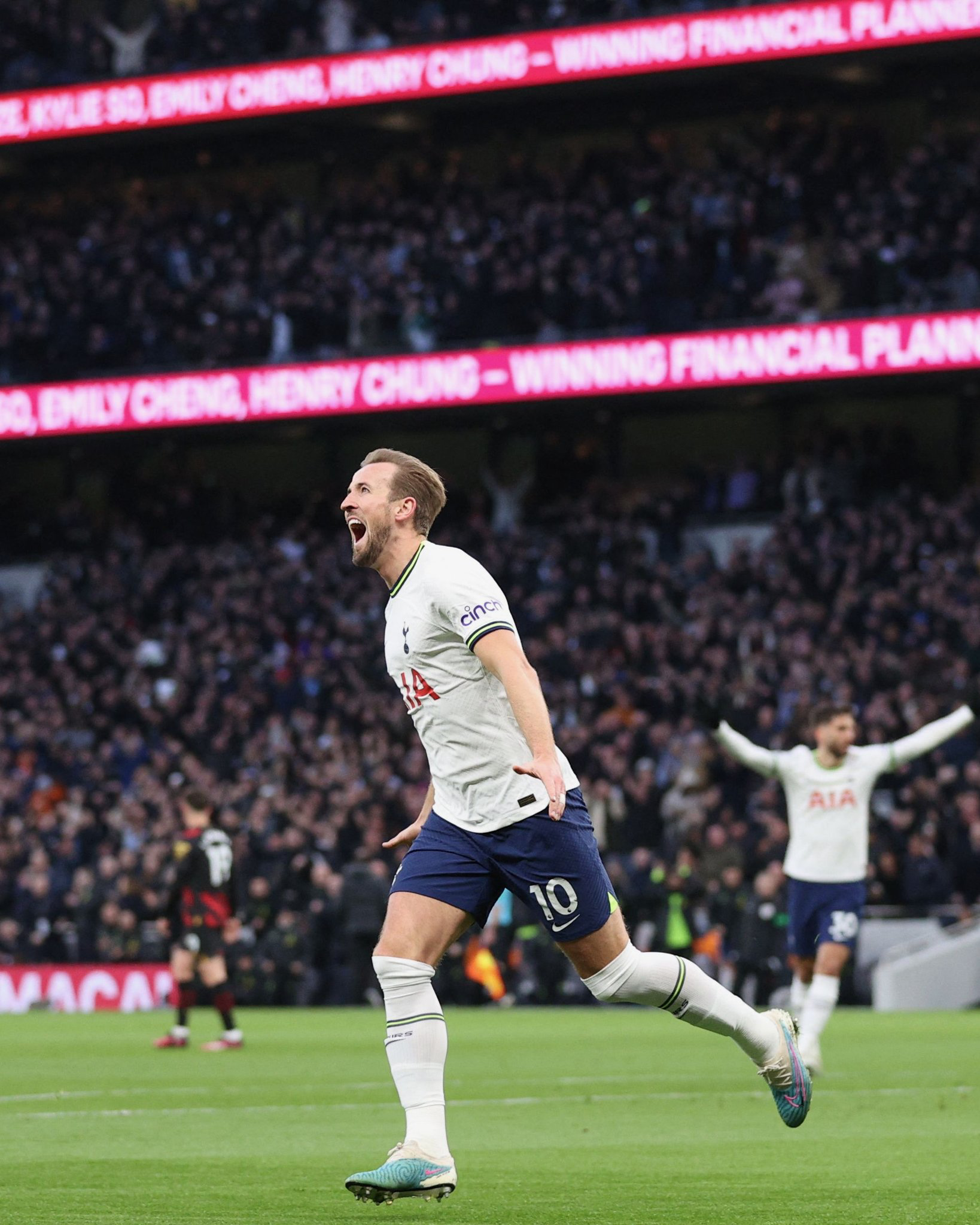 Harry Kane celebrates his record for most Tottenham goals all-time