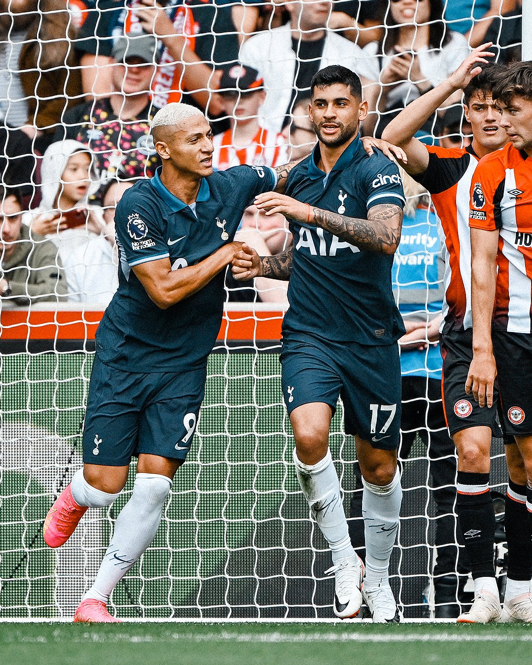 Cuti Romero celebrates his goal with Richarlison.