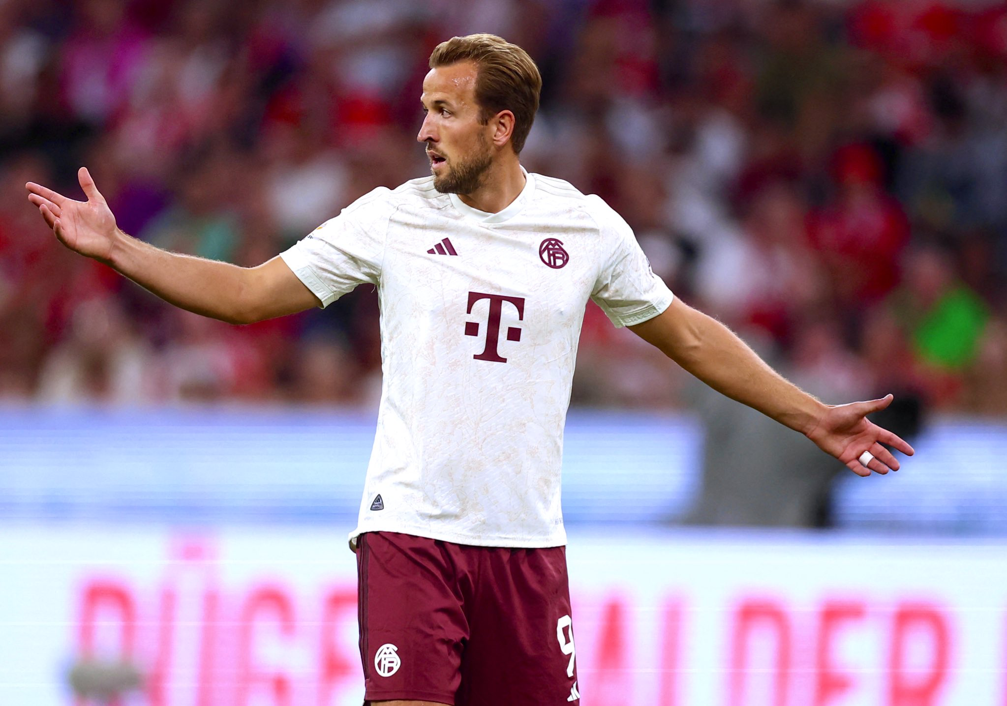 Harry Kane shrugs during the Bayern vs Leipzig game.