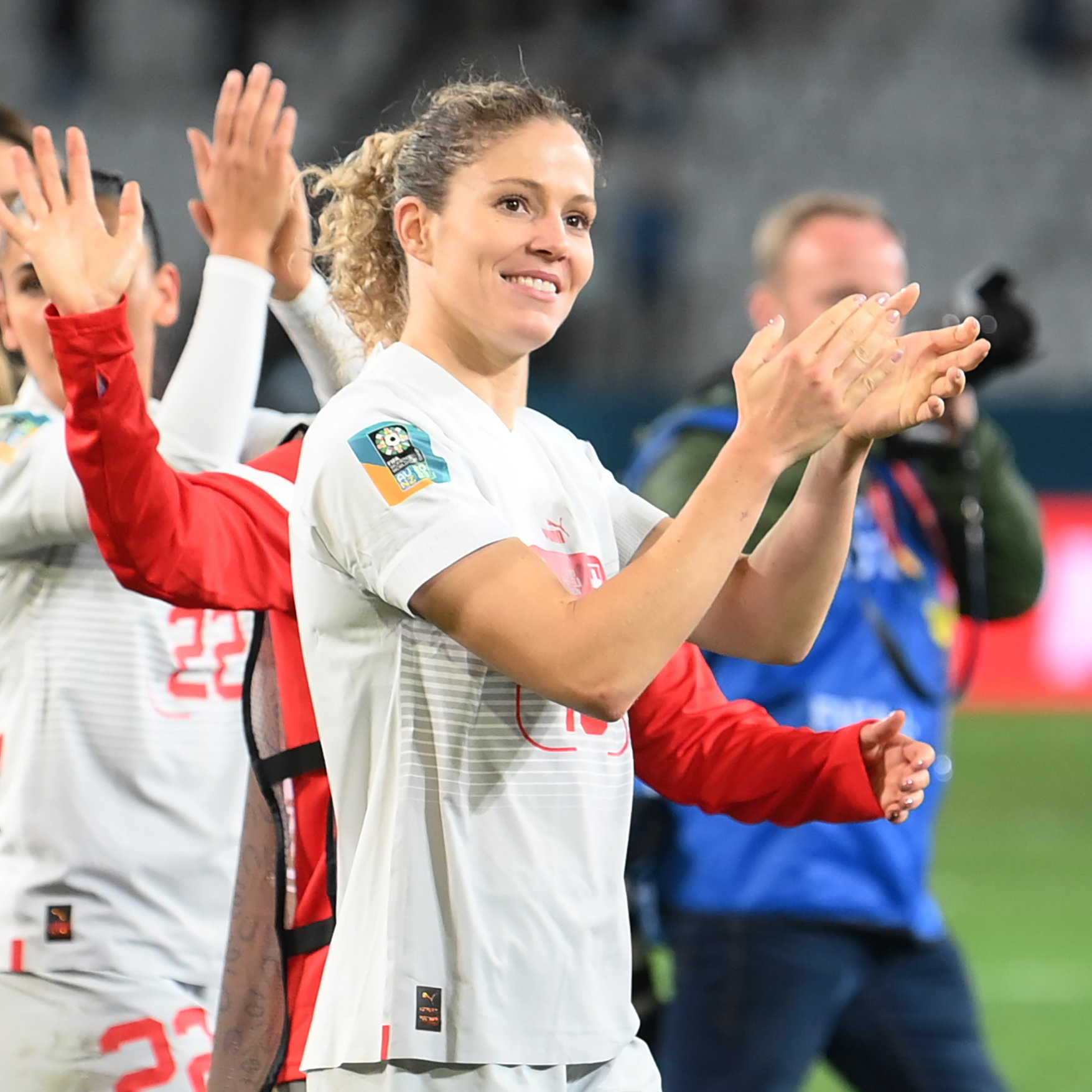 Luana Bühler claps the Switzerland supporters after their first group stage game.