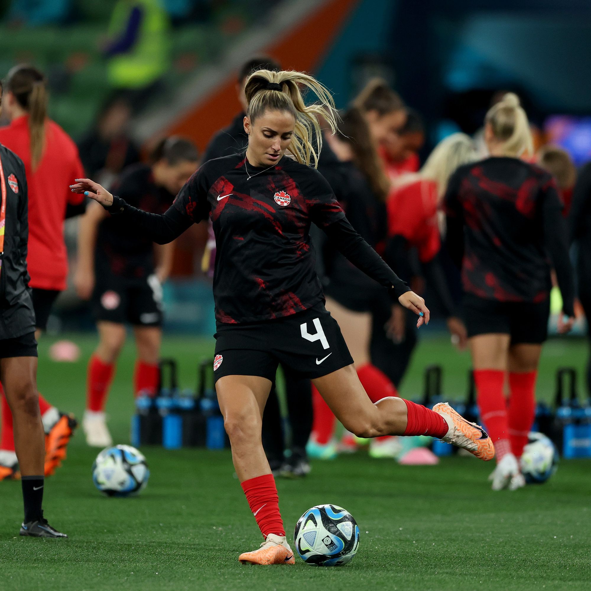 Shelina Zadorsky warms up for Canada at the World Cup.