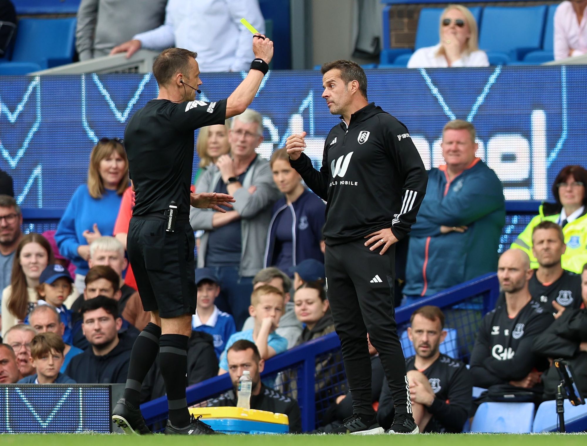 Marco Silva is shown a yellow card during the Everton vs Fulham match.