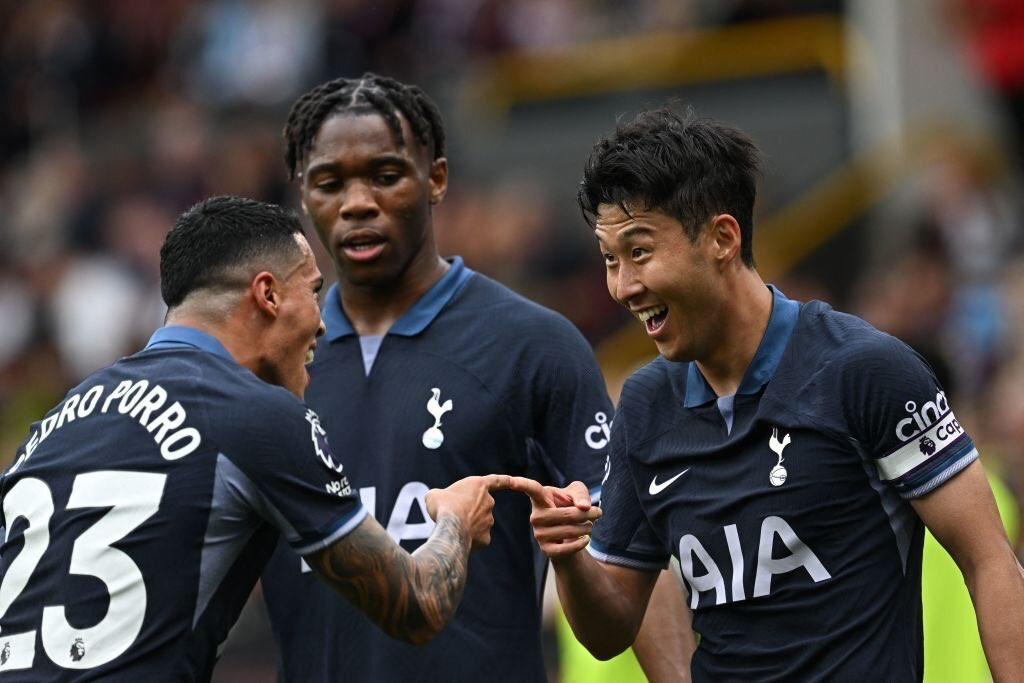 Pedro Porro celebrates assisting Son Heung-min's third goal by linking fingers.