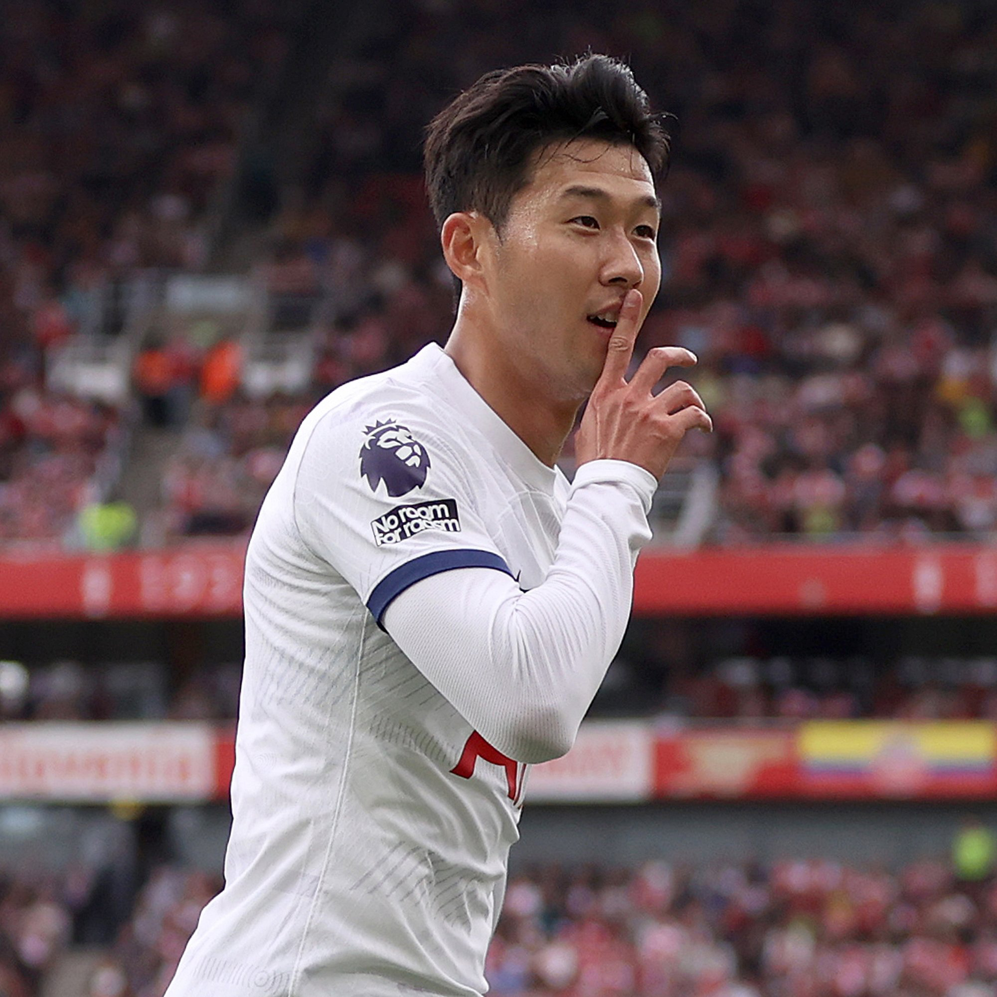 Son Heung-min hushes the Arsenal home crowd.