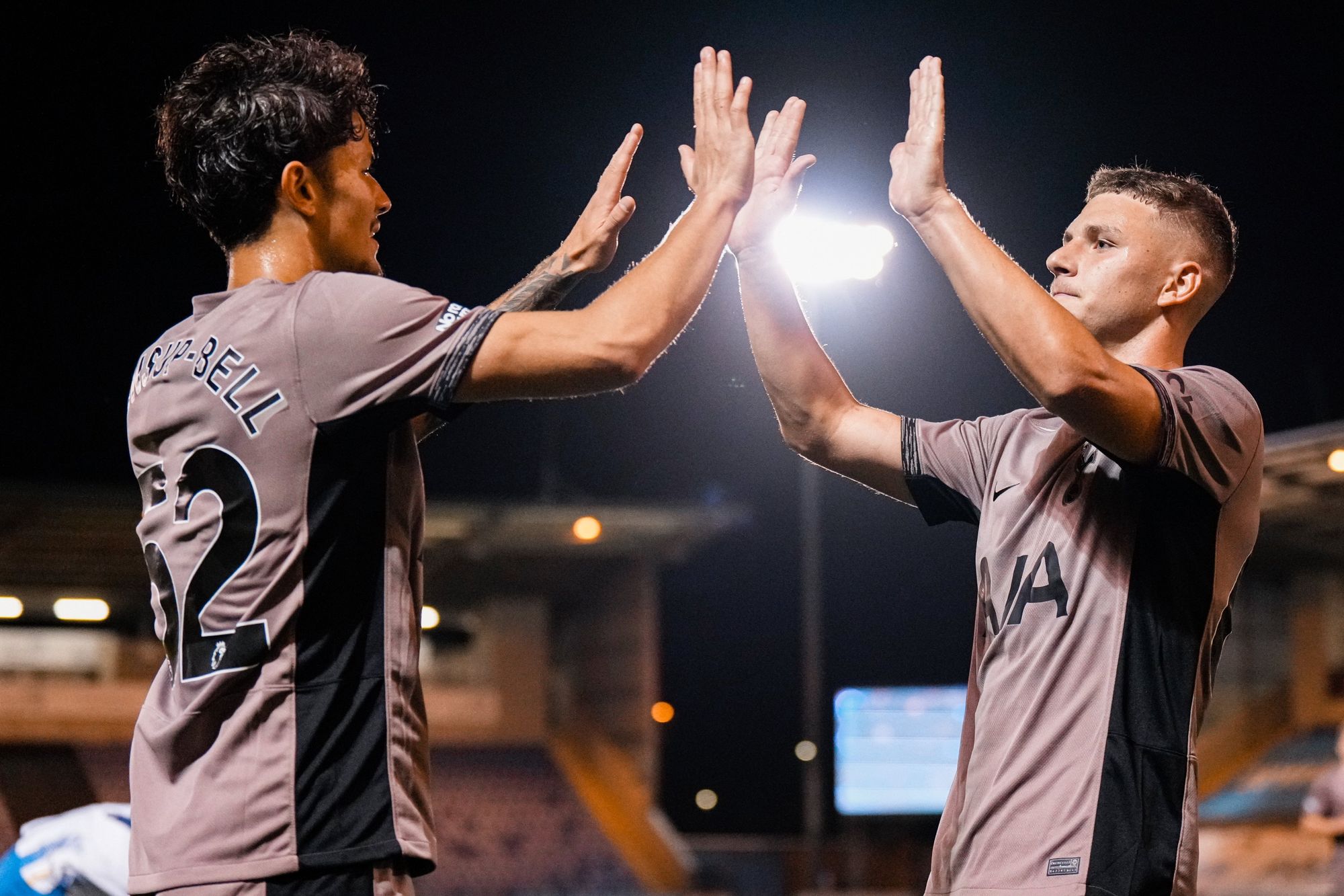 Jude Soonsup-Bell and Jamie Donley high five.