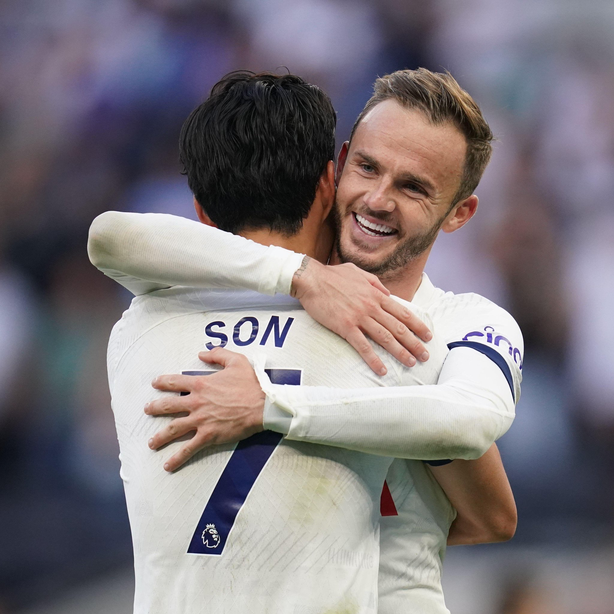 James Maddison hugs Son Heung-min.