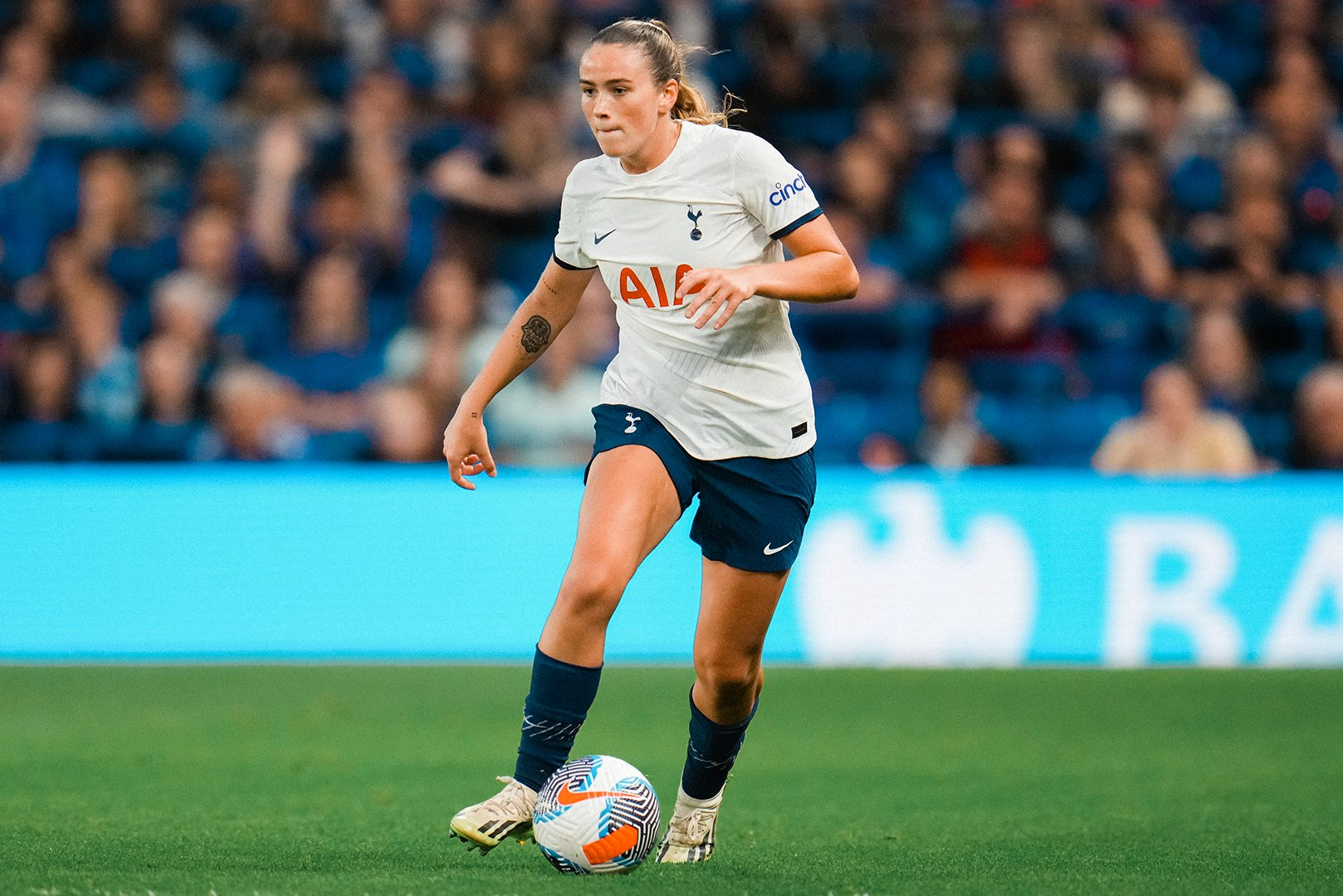 Grace Clinton dribbles the ball during her Spurs debut.