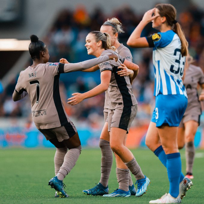 Grace Clinton celebrates her first Spurs goal with Jessica Naz.