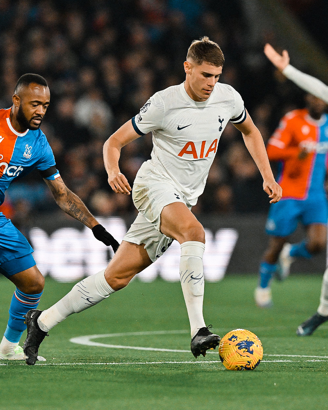 Micky van de Ven easily dribbles past Jordan Ayew.