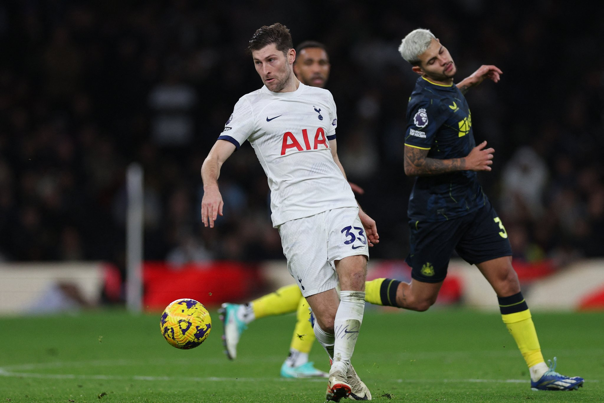 Ben Davies arrives for a crucial clearance.