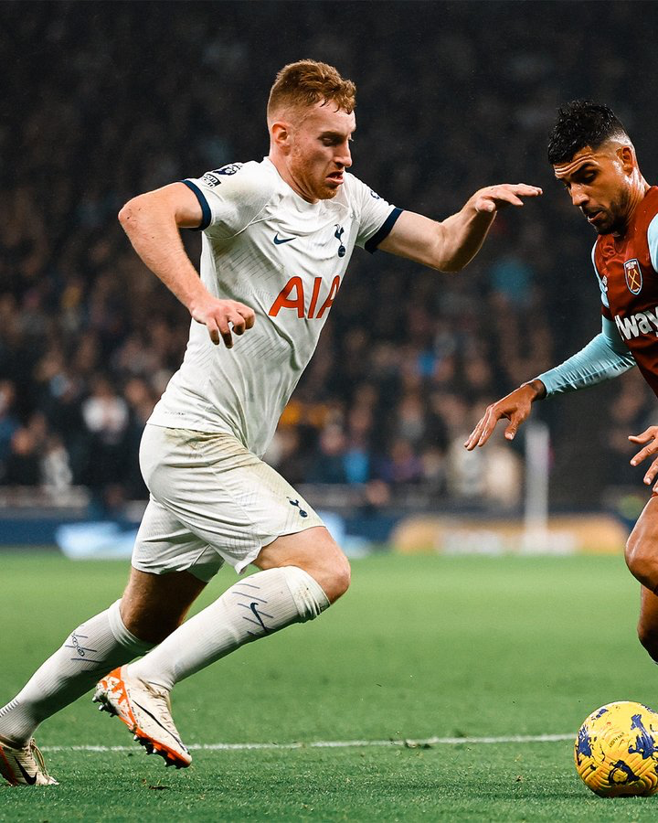 Dejan Kulusevski duels for the ball with a West Ham player.