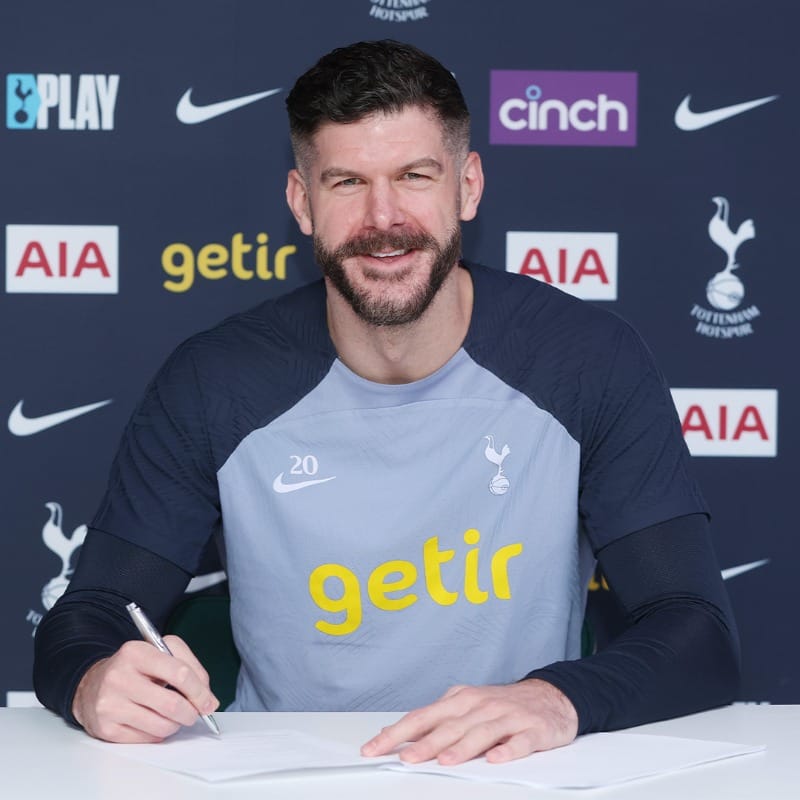 Fraser Forster signs his new contract.