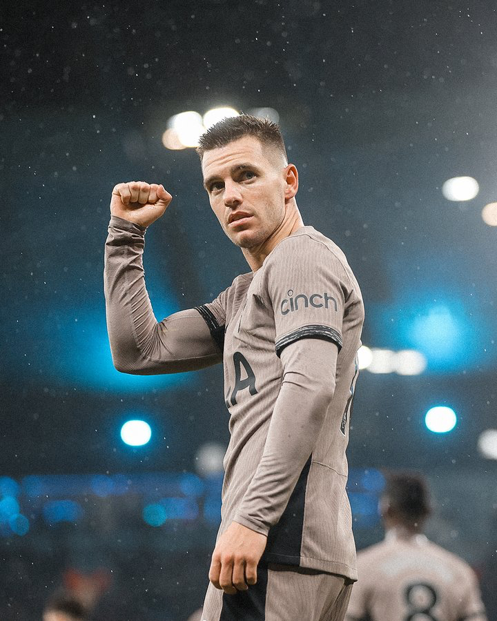 Giovani Lo Celso holds up a fist after scoring against Manchester City.