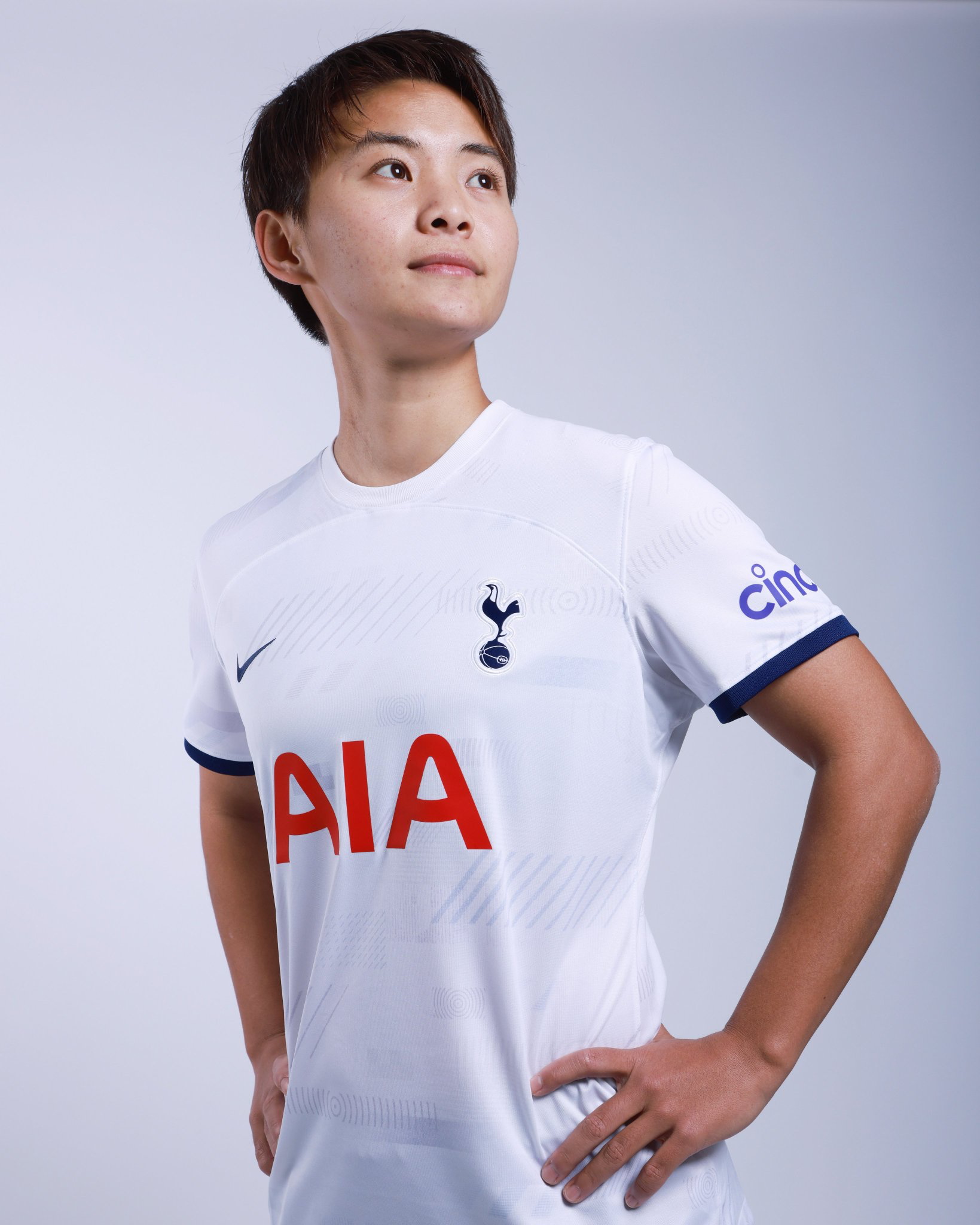 Shuang Wang wears the Tottenham shirt after signing with the club.