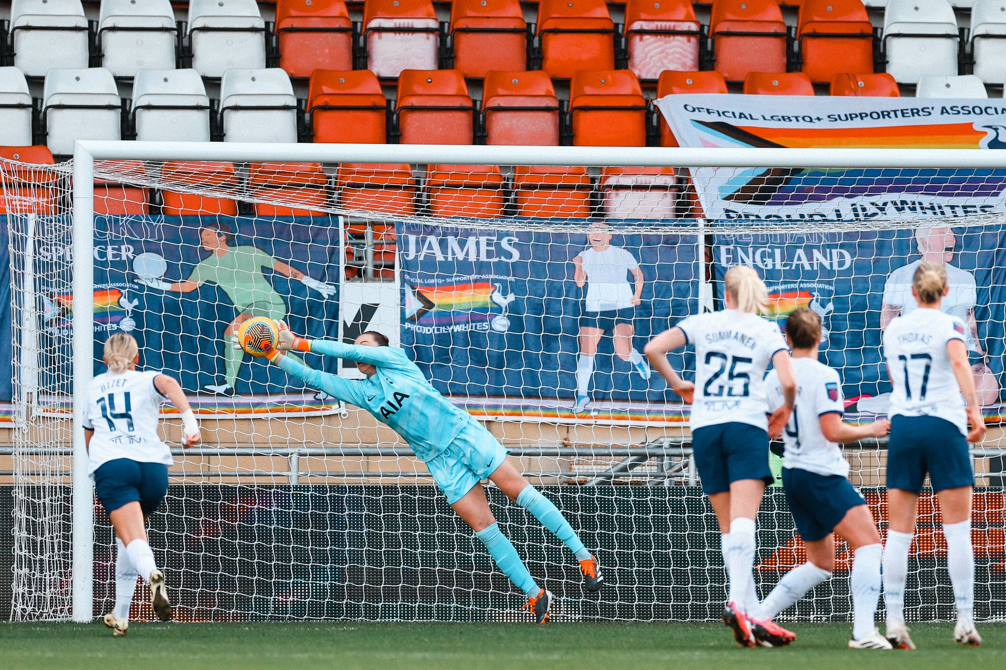 Barbora Votíková saves a free kick at full extension.