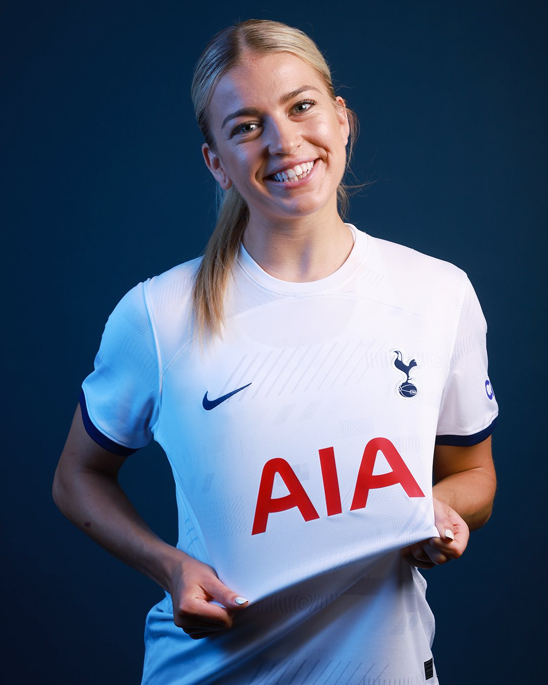 Charli Grant poses in her new Spurs shirt.