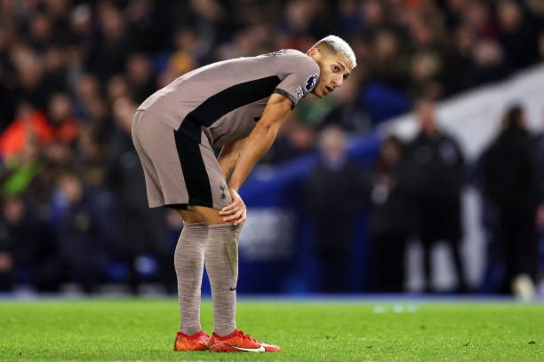 Richarlison holds his hands on his knees.