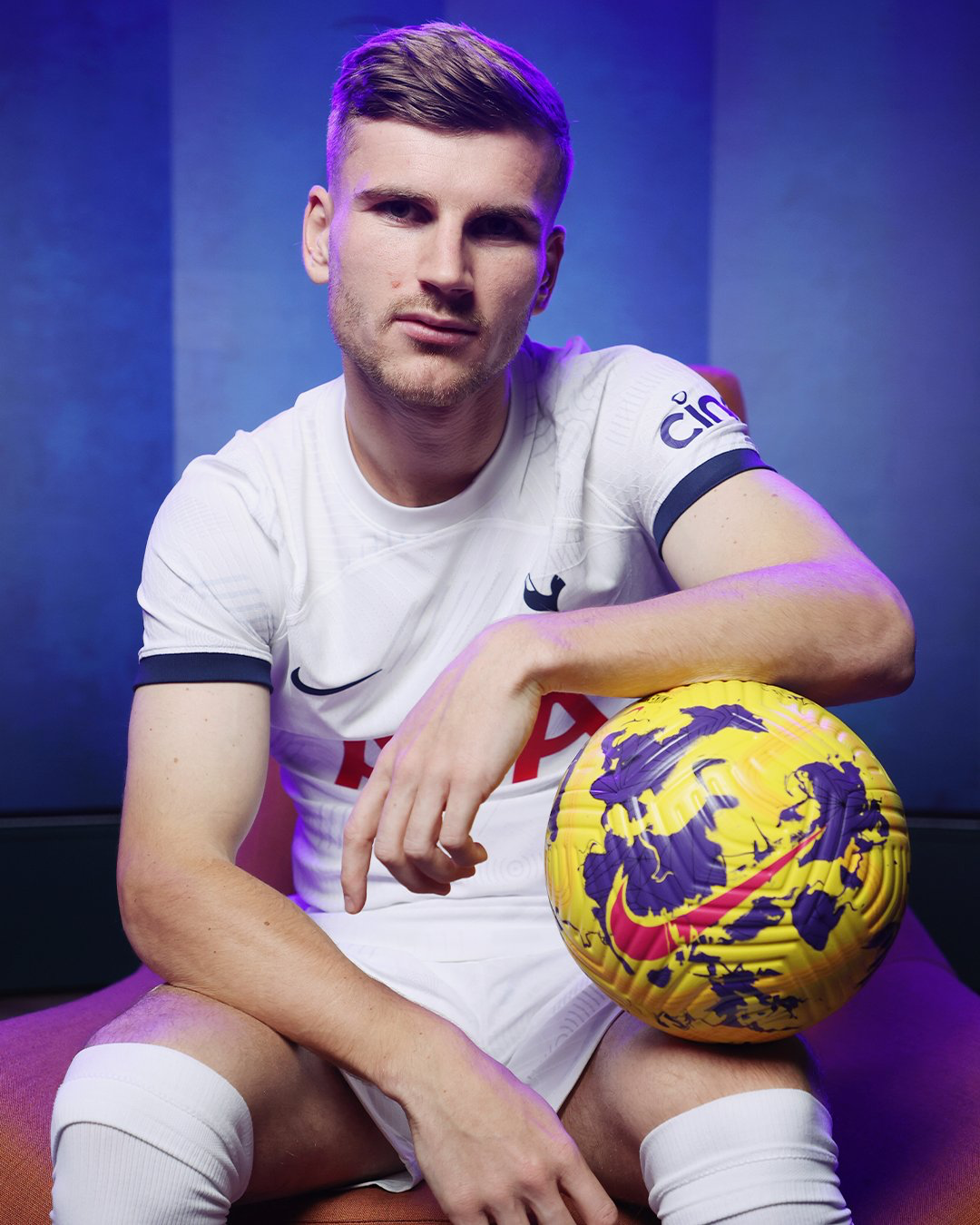 Timo Werner holds a ball on his left knee in a signing promo photo.