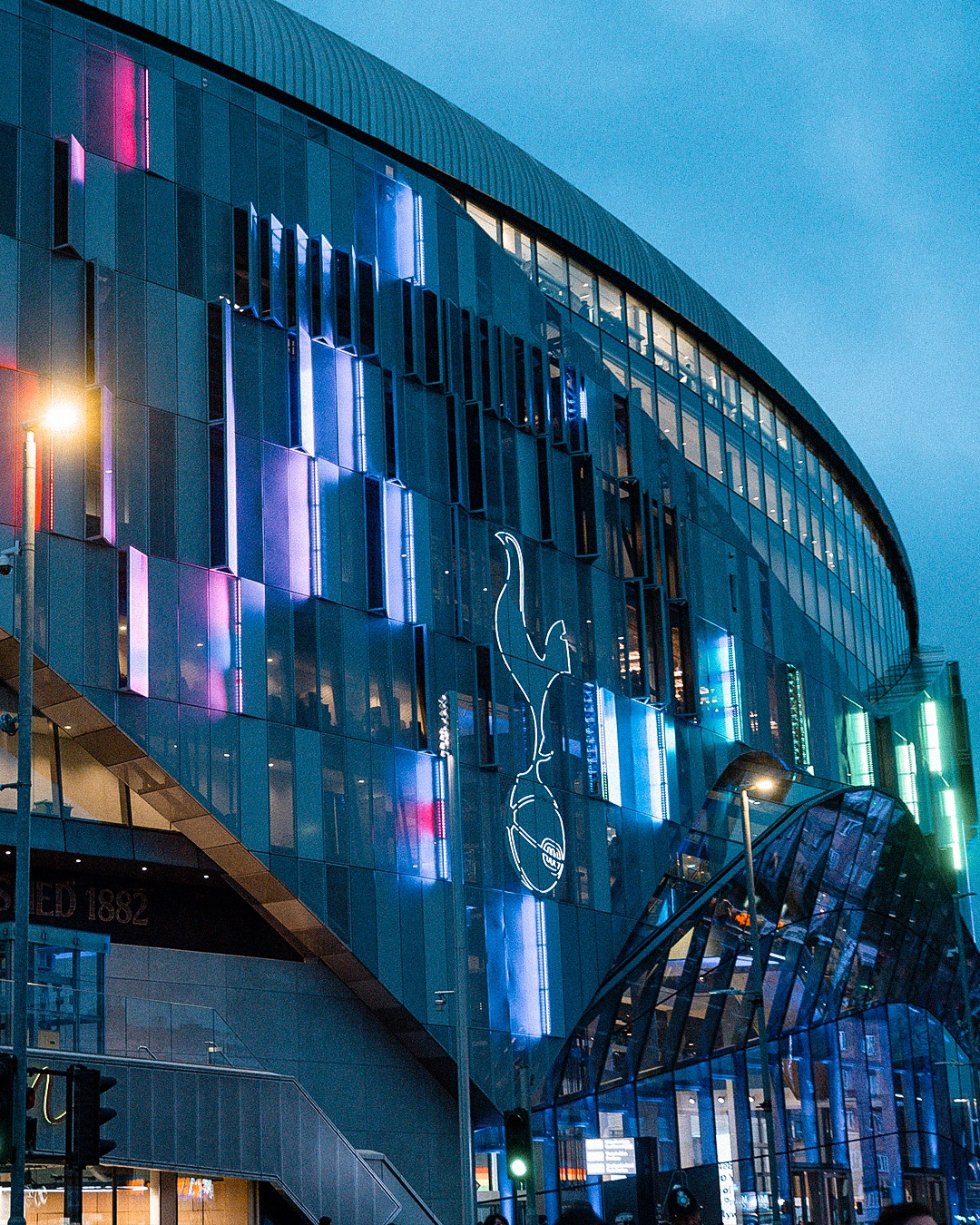 The Tottenham Hotspur Stadium is lit up in rainbow colors to celebrate the Proud Lilywhites.