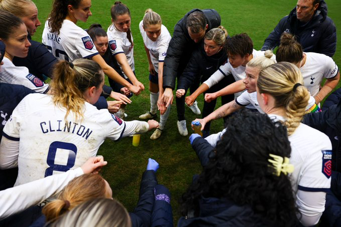 The team huddles ahead of the penalty shootout.