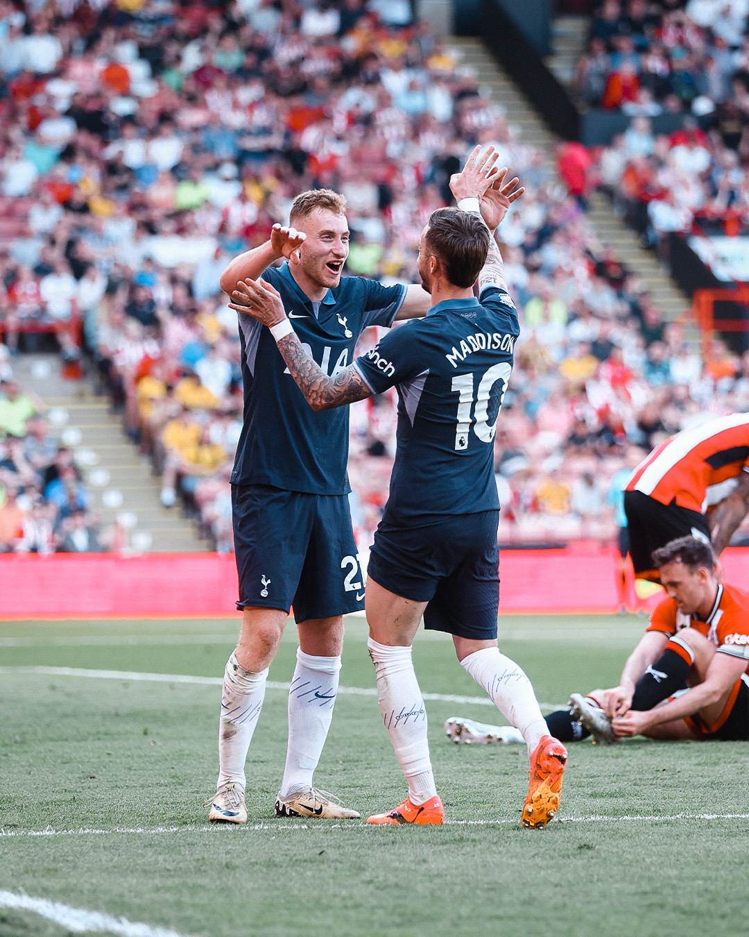 Dejan Kulusevski celebrates an assist from James Maddison.