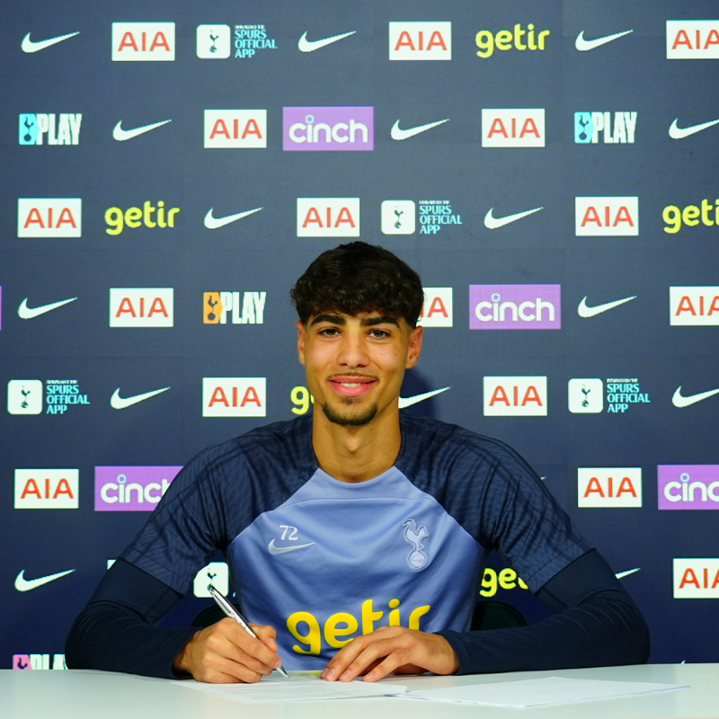 George Abbott signs his new contract.