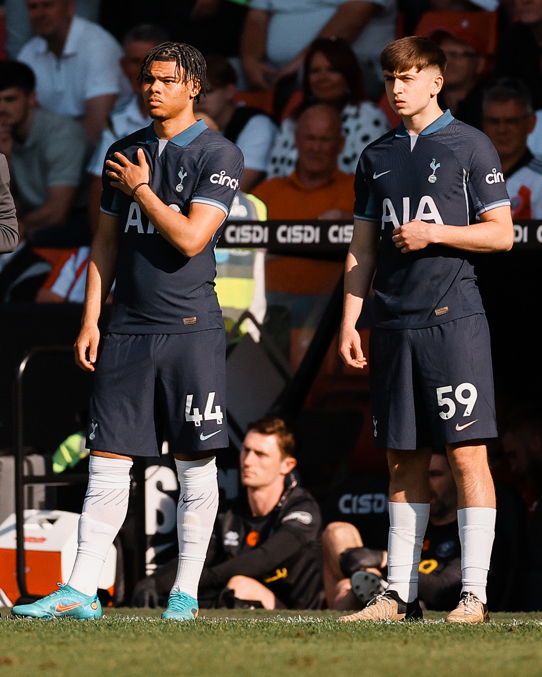 Dane Scarlett and Mikey Moore prepare to sub into the game.