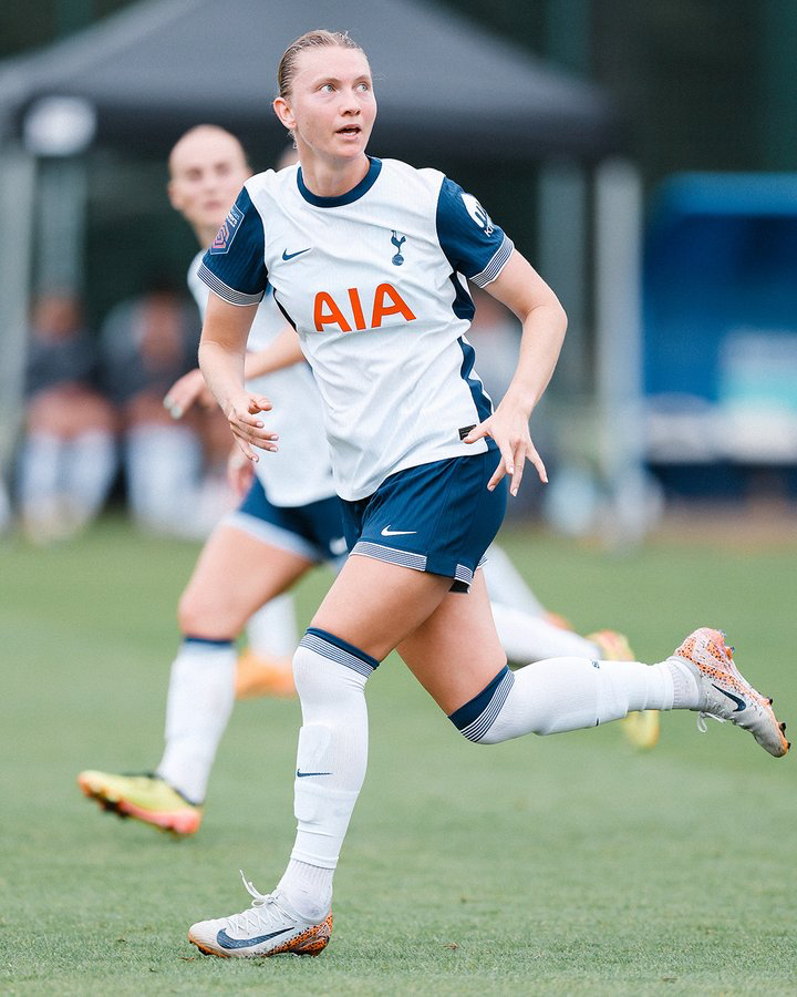 Clare Hunt runs in a pre-season friendly.