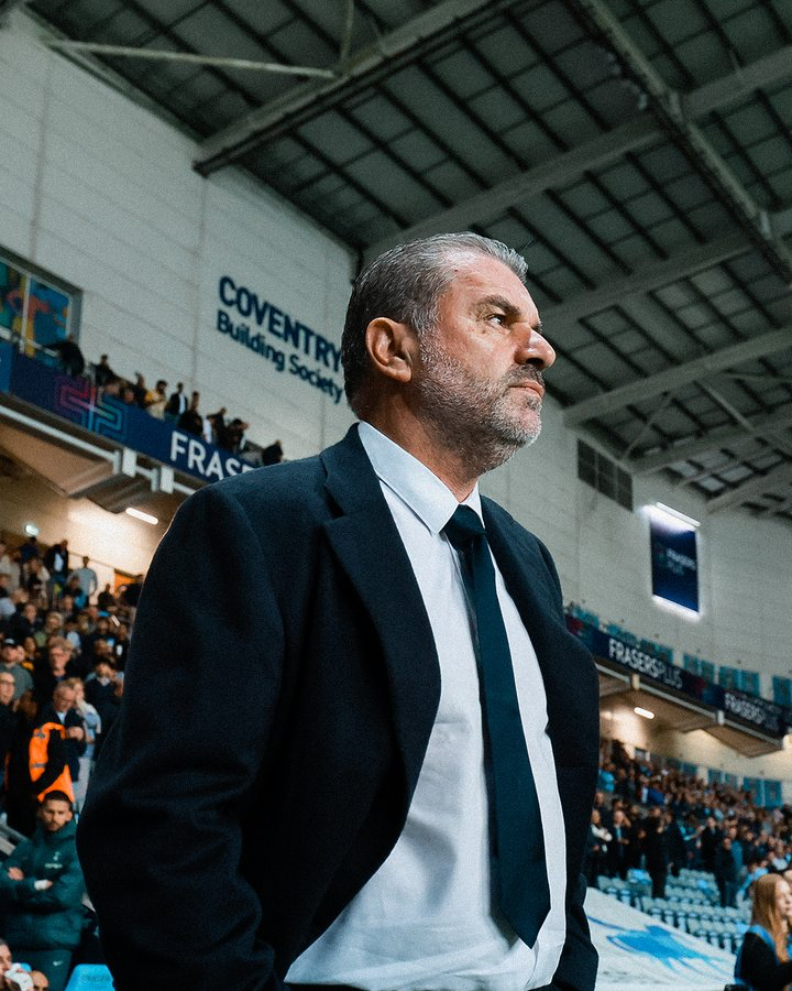 Ange Postecoglou observes the game from the touchline.