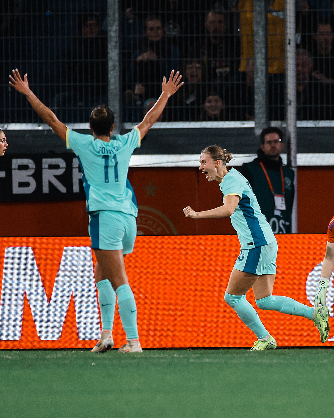 Clare Hunt celebrates after heading home her first goal for Australia.