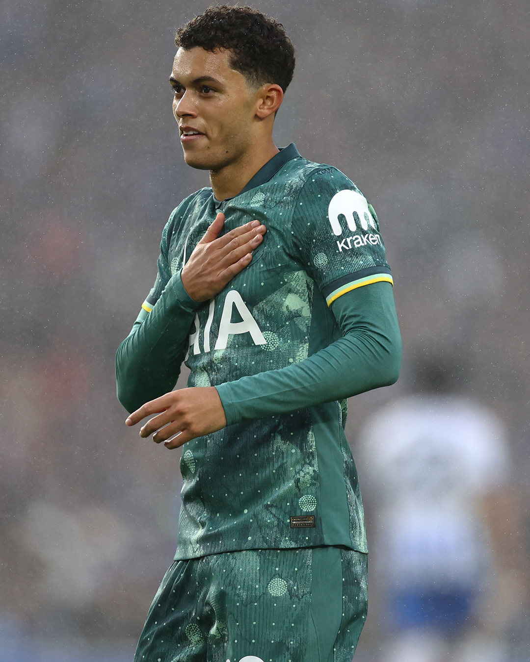 Brennan Johnson taps the badge after scoring his 