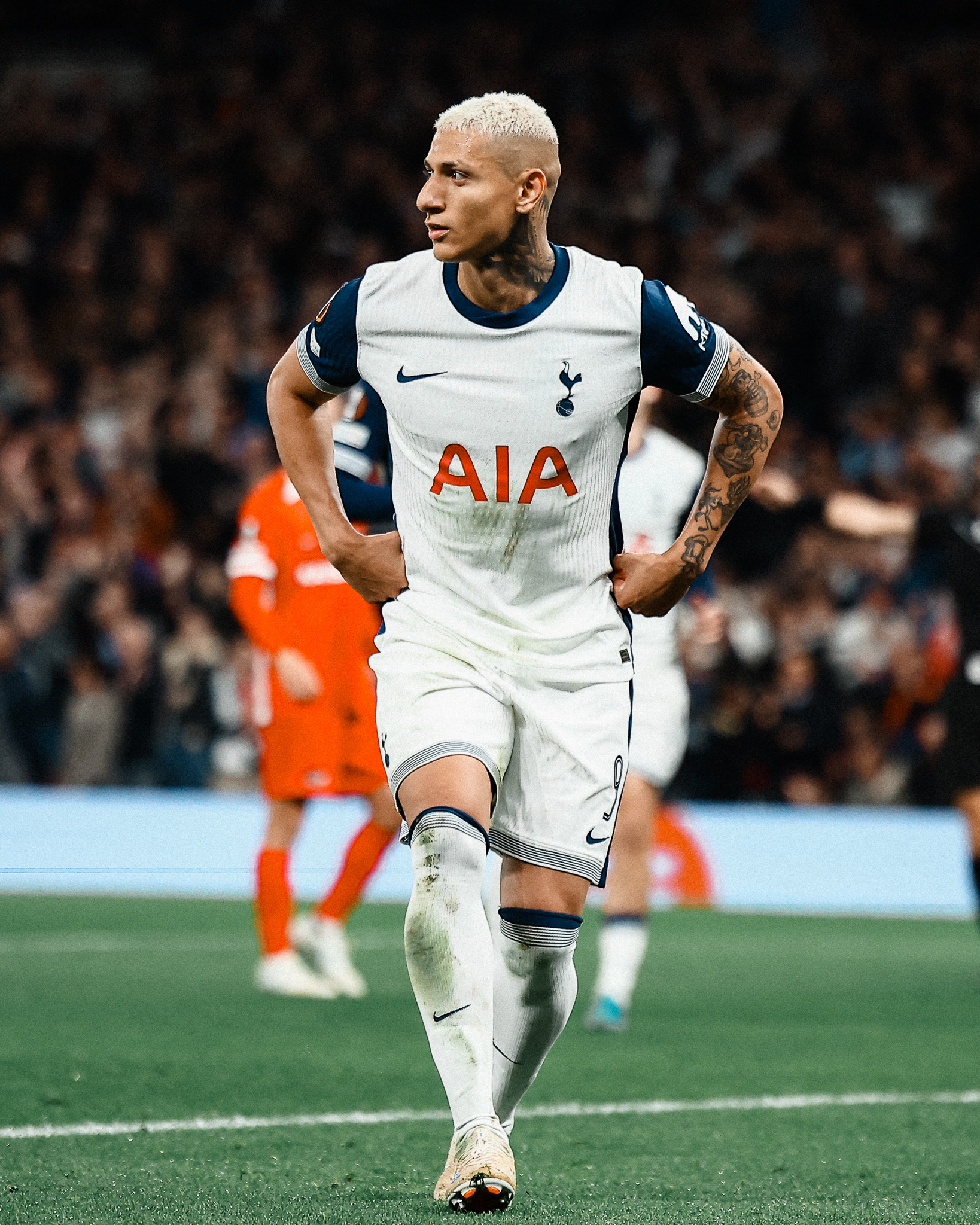 Richarlison does his signature pigeon dance goal celebration after scoring a penalty.