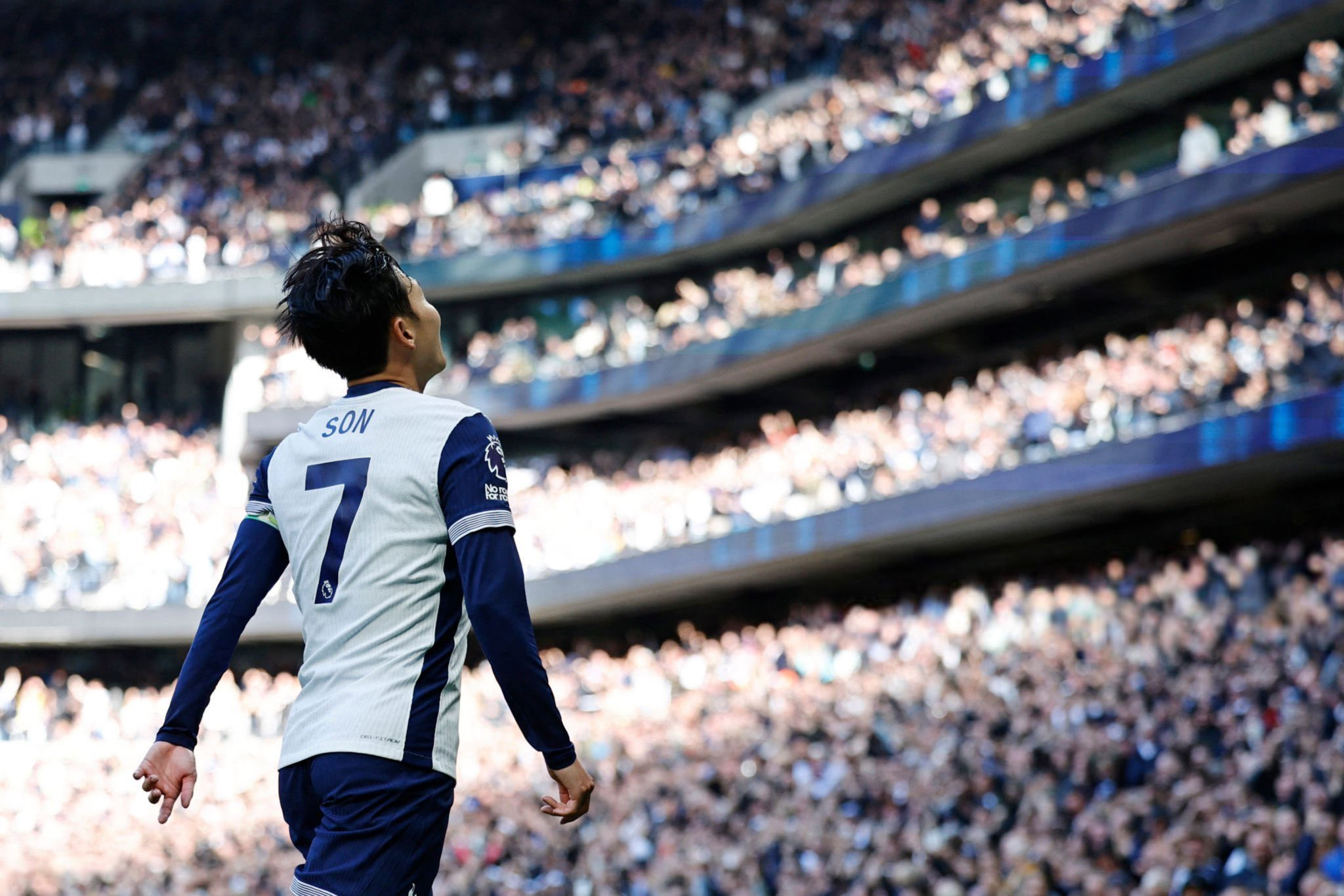 Son Heung-min faces the crowd after scoring a goal. 