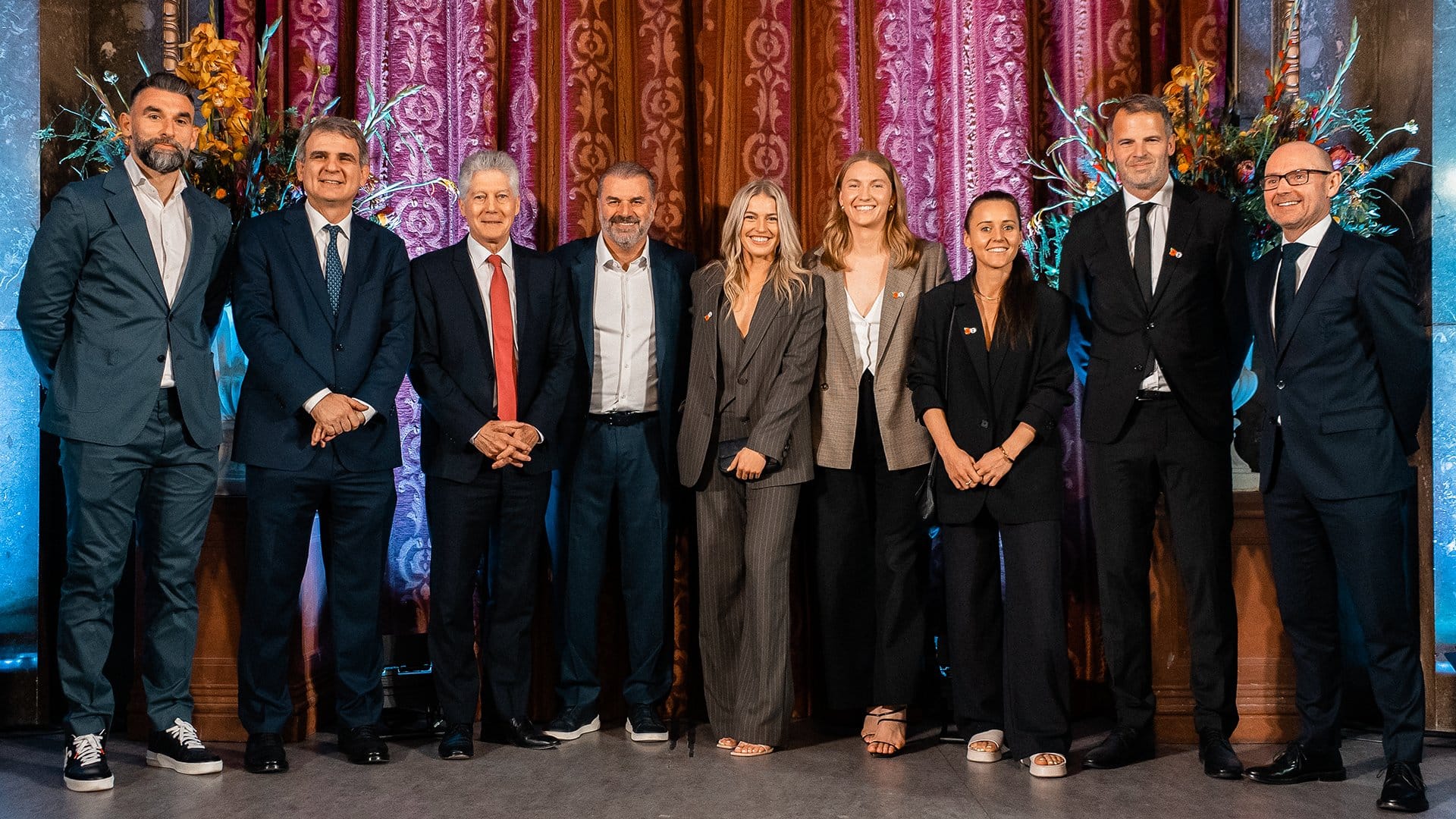 The Australian players, coaches, and executives across the club gathered for a photo at the Australian High Commission.