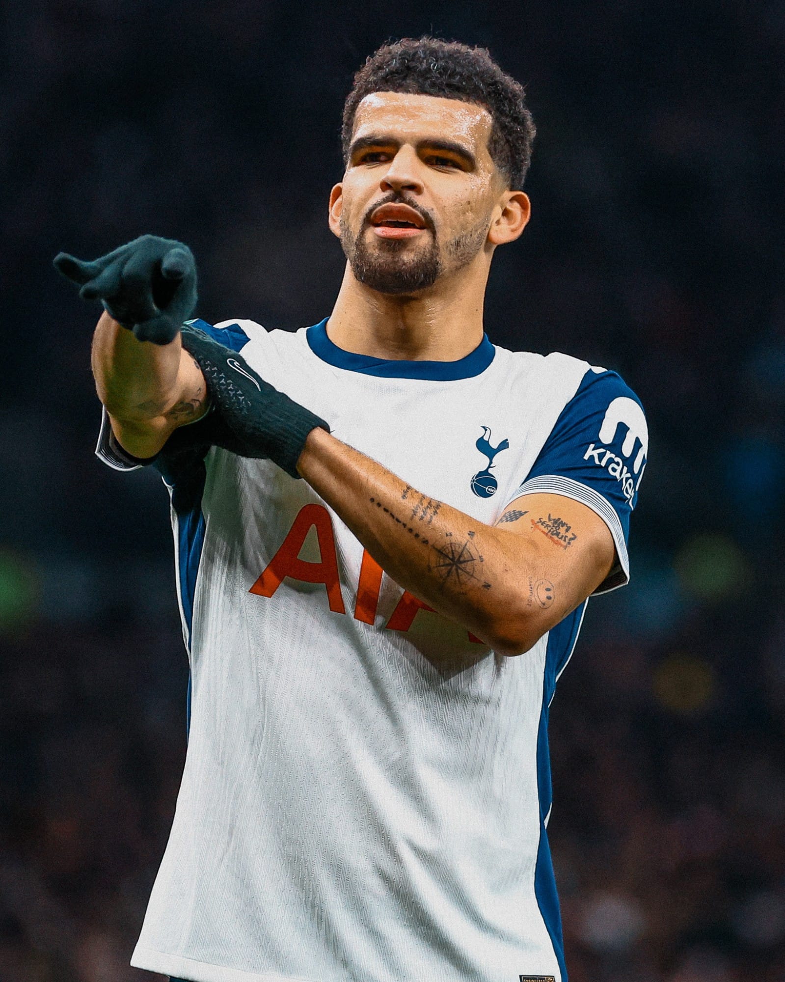 Dominic Solanke does his signature bow and arrow goal celebration.