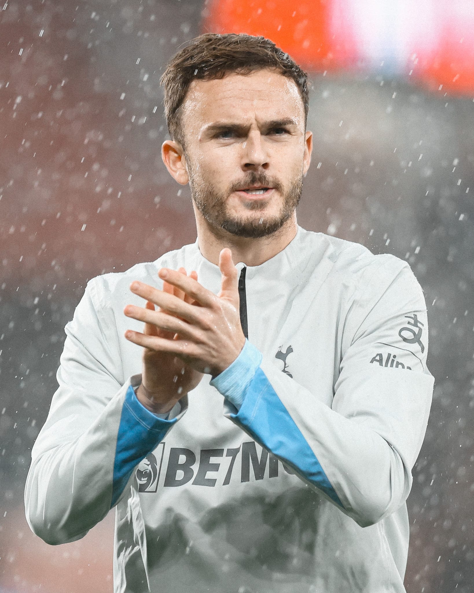 James Maddison warms up in the rain at Bournemouth.