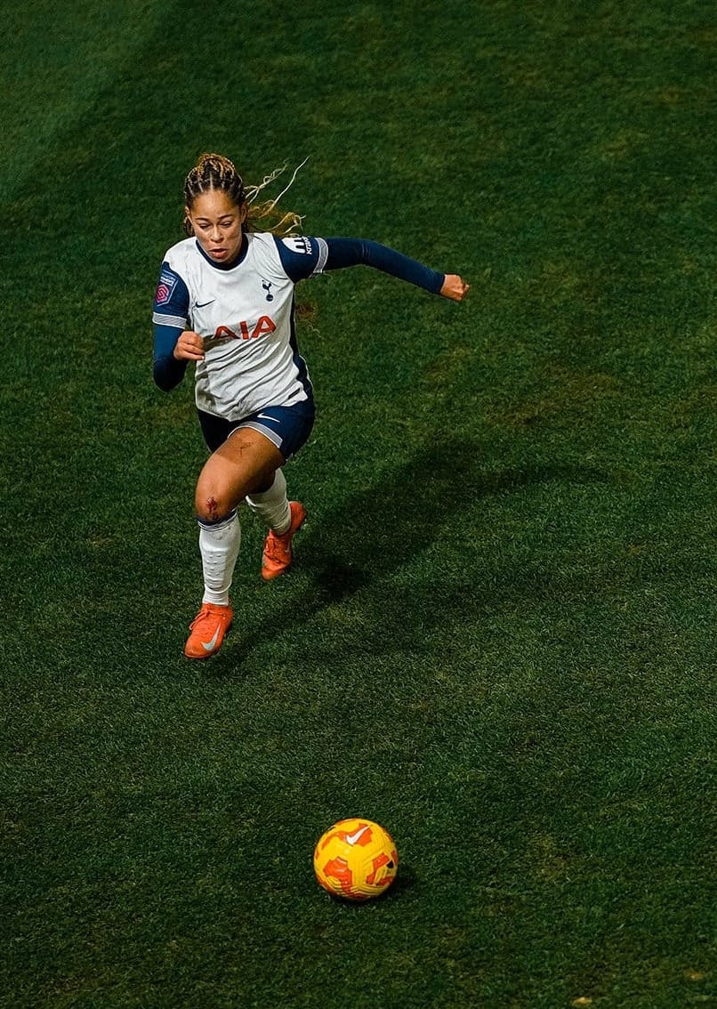 Lenna Gunning-Williams runs to approach the ball.