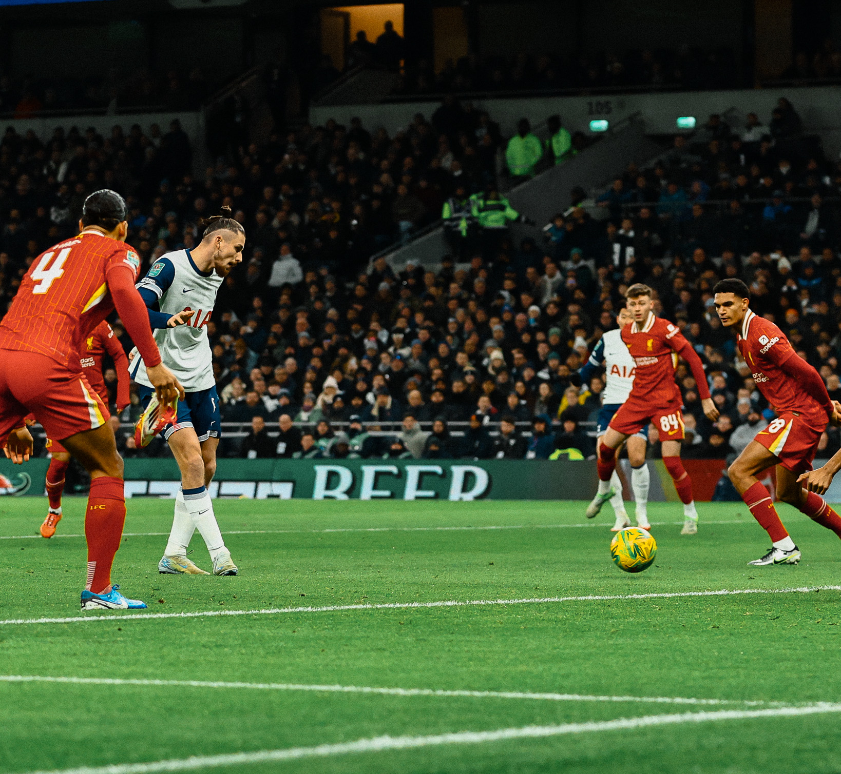 Radu Drăgușin shoots the ball in the box. 