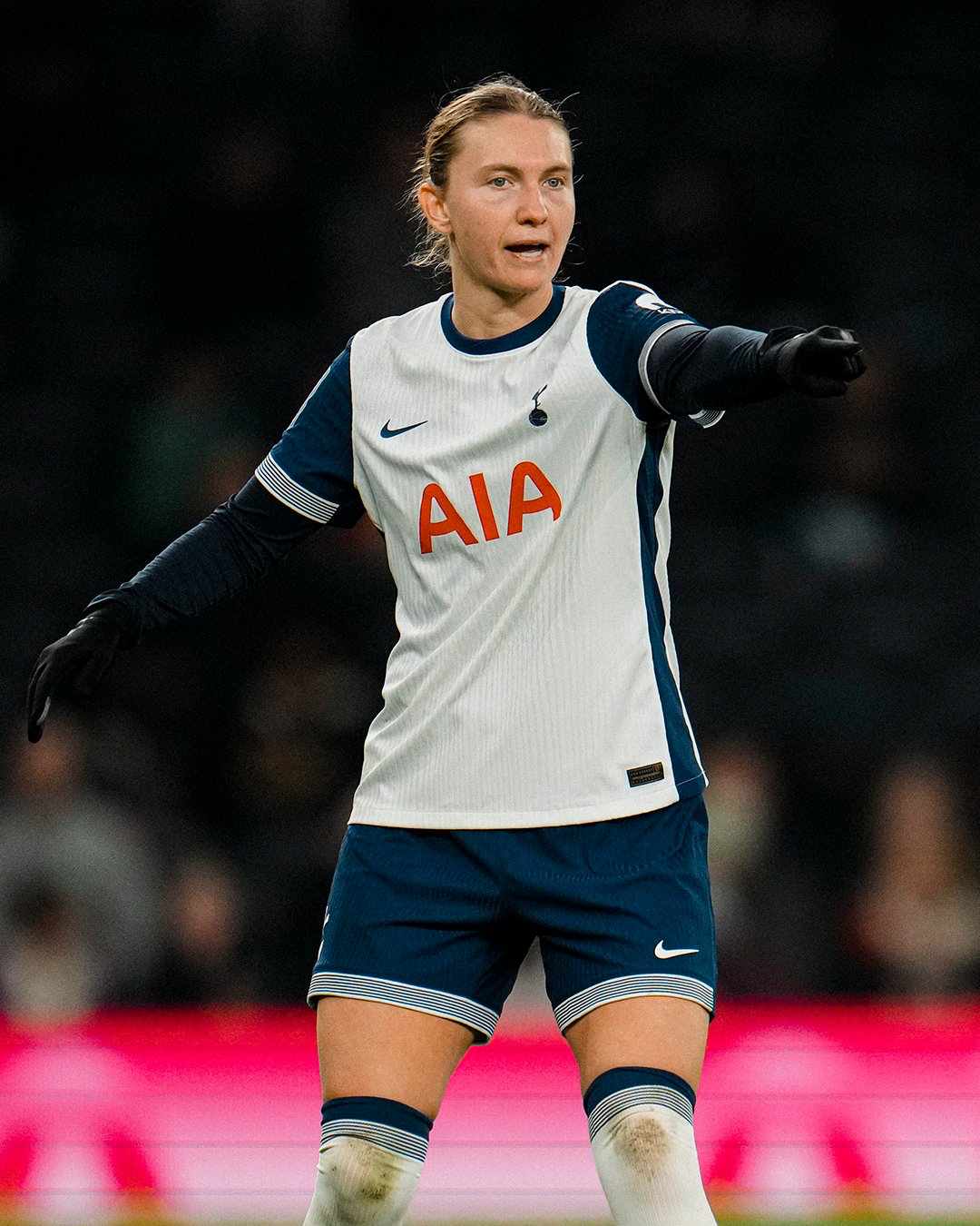 Clare Hunt points during the United game. 